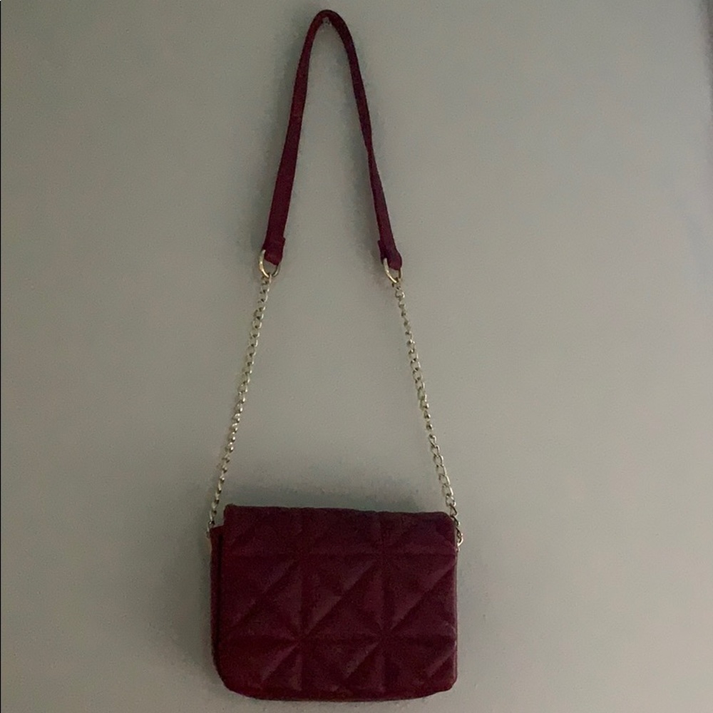 Burgundy purse with gold and burgundy strap